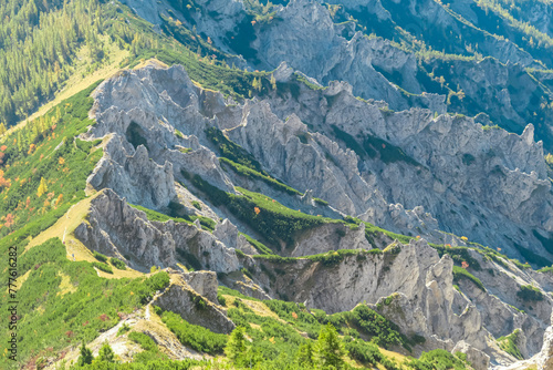 Panoramic view of unique rock formation in Hochschwab mountain range, Styria, Austria, Scenic hiking trail from Karlhochkogel via Kaefereck to Sankt Ilgen. Escapism in remote Austrian Alps. Wanderlust photo
