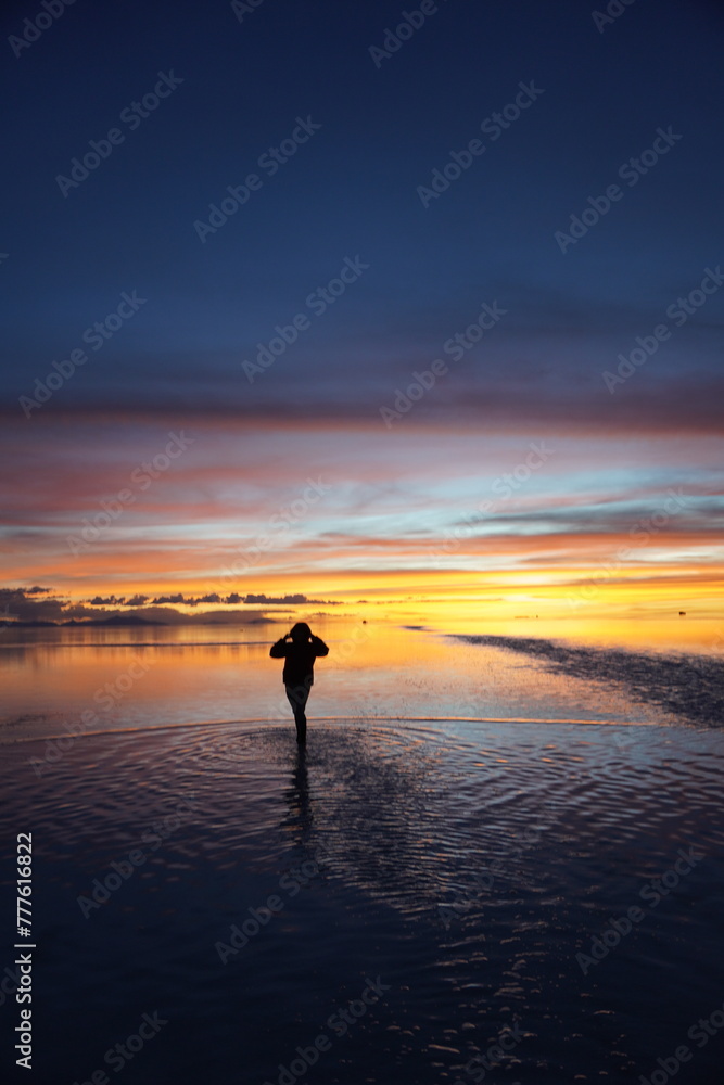 silhouette of a person at sunset