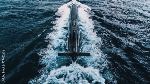 Stealth and power of a black submarine as it emerges from the waves