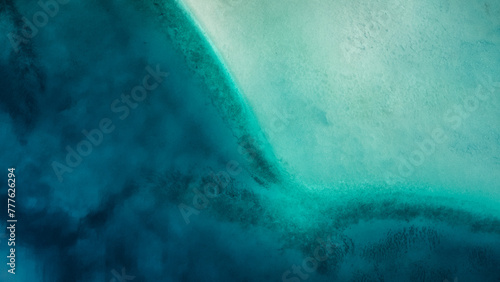 Turquoise and blue waters of Lake Michigan from the sky