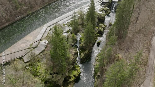 A slow orbit establishing shot over Traunfall Austria photo