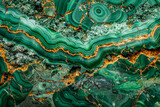 Close-up of natural malachite stone showcasing its unique concentric banding in rich shades of green, embodying the beauty of geological formations