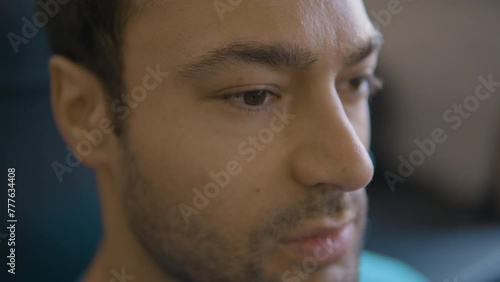 Face Eyes Close-up of Bearded Fit Man Breathing Heavly in Gym after Training photo