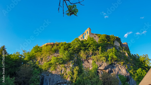 Scenic view of medieval Finkenstein Castle in Altfinkenstein, Carinthia, Austria. Tranquil atmosphere along hiking trail in spring. Steep cliff at southern foot of the Karawanks mountain range photo