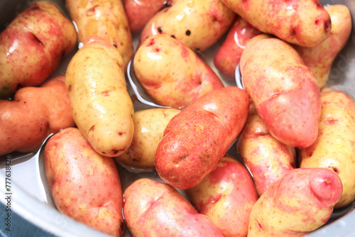 Photo of clean native potatoes. Concept of natural foods.