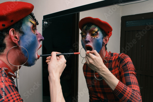 Drag queen doing her make up