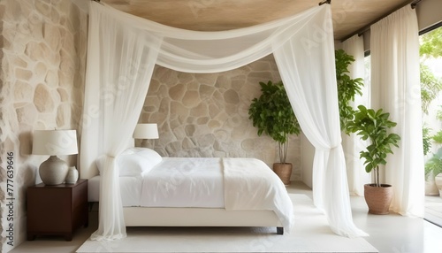 A serene bedroom sanctuary featuring a canopy bed draped in sheer white curtains, flanked by smooth cream-colored stone walls adorned with minimalist artwork and a cluster of hanging planters filled w