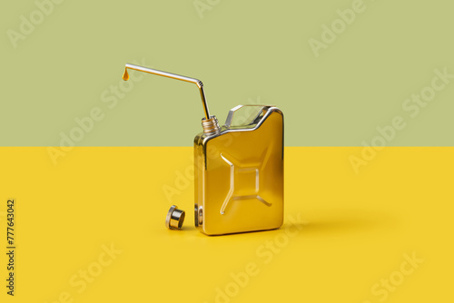 Silver metal canister with drop of fuel over duotone background