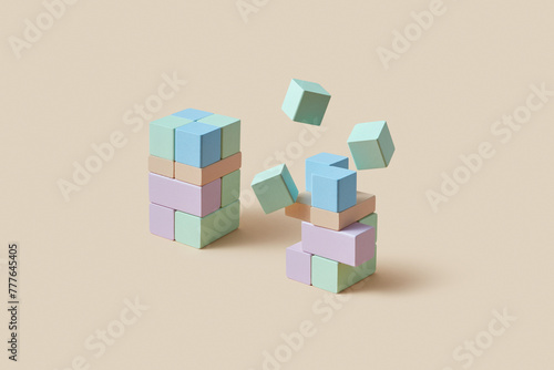 Whole and destroyed towers made of colorful wooden blocks in studio