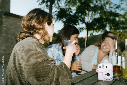 Chatting and Enjoying Drinks in the Pa photo