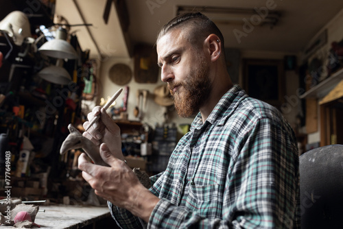 male needleworker photo