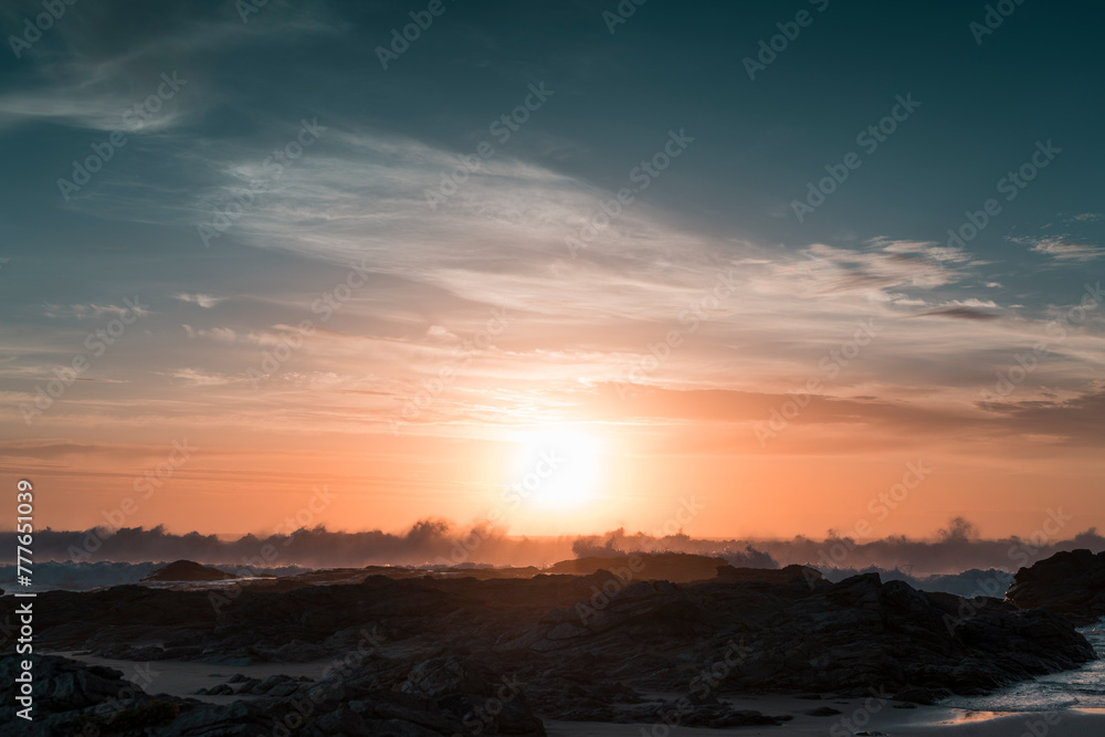 Wild coast with big waves during striking sunset Wild coast with big waves during striking sunset