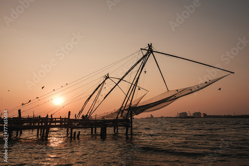 Fishing nets resting at senset. photo