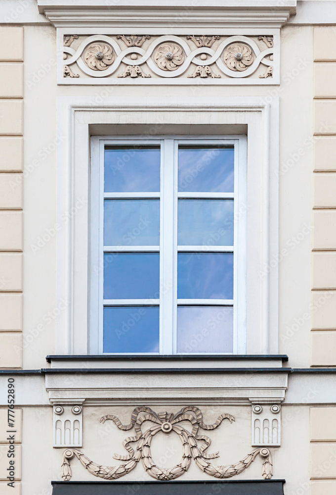 Ornate window of an old building Ornate window of an old building