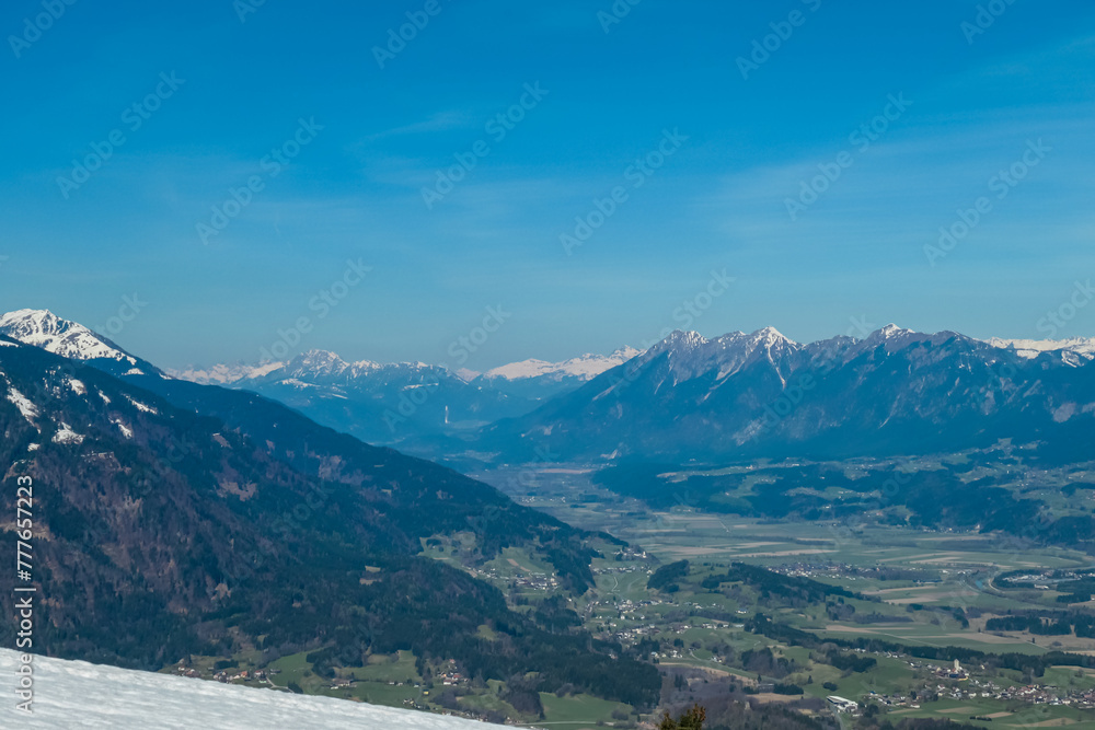 Panoramic view of Gailtal valley surrounded by Gailtal Alps and High Tauern. Looking from Dreilaendereck, Carinthia, Austria. Borders between Austria, Slovenia, Italy. Looking at alpine landscape Panoramic view of Gailtal valley surrounded by Gailtal Alps and High Tauern. Looking from Dreilaendereck, Carinthia, Austria. Borders between Austria, Slovenia, Italy. Looking at alpine landscape