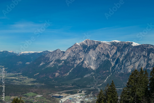 Panoramic view of majestic mountain peak Dobratsch seen from Dreilaendereck (Pec, Often, Monte Forno) in untamed Karawanks, Carinthia, Austria. Alpine landscape in spring in Austrian Alps. Wanderlust photo