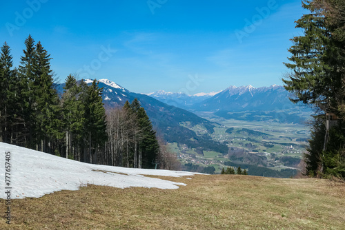 Panoramic view of Gailtal valley surrounded by Gailtal Alps and High Tauern. Looking from Dreilaendereck, Carinthia, Austria. Borders between Austria, Slovenia, Italy. Looking at alpine landscape photo