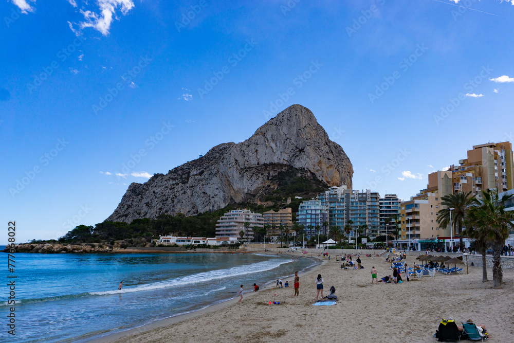 Calpe beach in spring with the mountains in the background.