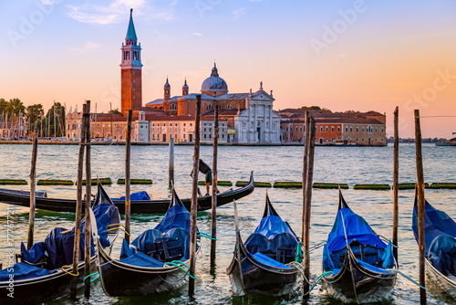 San Giorgio Maggiore and gondolas in Venice on the Grand Canal, Italy photo