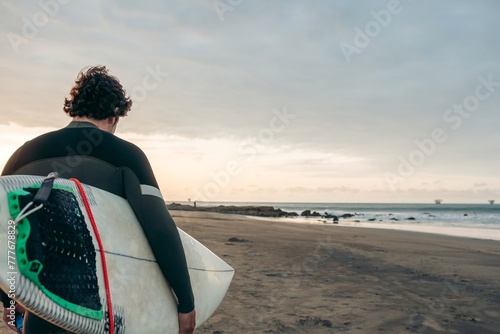 Surfer going to the water