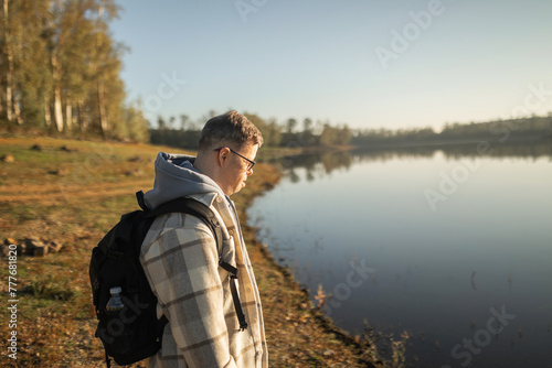 man with down syndrome walking in nature