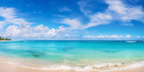 Empty sand beach with blue ocean with blue sky with clouds on sunny day