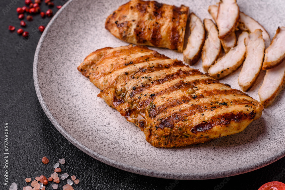 Delicious fresh grilled chicken fillet with spices and herbs Delicious fresh grilled chicken fillet with spices and herbs
