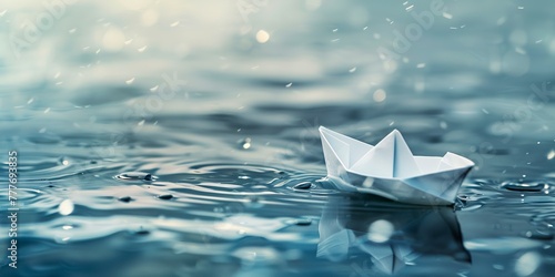 Serene and calm scene of a simple paper boat floating on the water surface. Paper boat sailing in serene water and cloudy weather. photo
