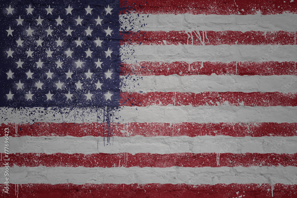 painted big national flag of united states of america on a massive old brick wall painted big national flag of united states of america on a massive old brick wall