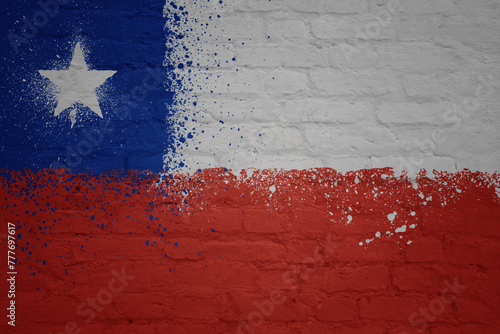 painted big national flag of chile on a massive old brick wall