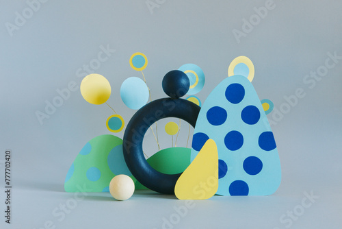 Different colored objects together on paper background photo