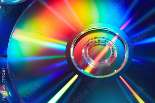 Rainbow light refraction on surface of compact CD disk photo