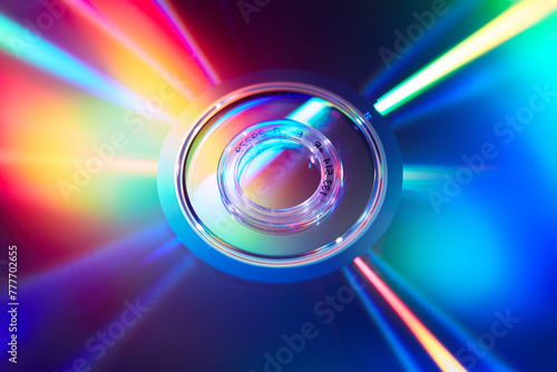 Dynamic display of compact CD disc reflecting multicolor light
