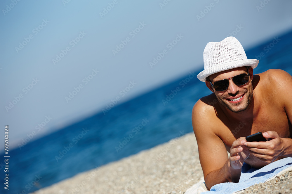 Man, beach and smartphone in portrait on holiday with ocean on seashore with blue sky in summer for peace. Male person, vacation and relax with phone for memories in cancun with wellness on trip