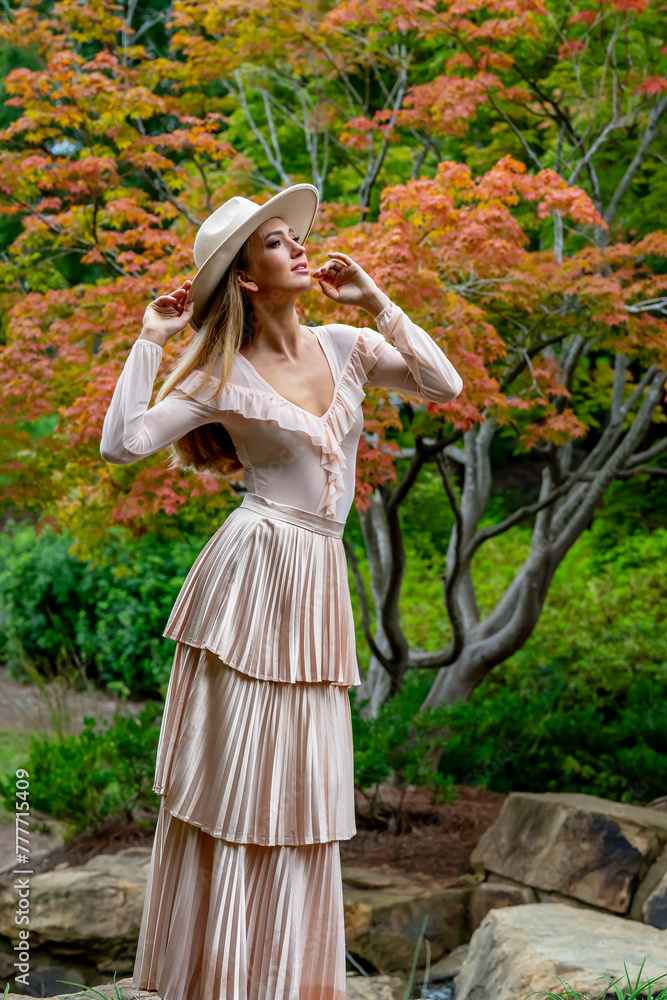 Autumn Elegance: A Stunning Model's Stroll Through Nature's Canvas