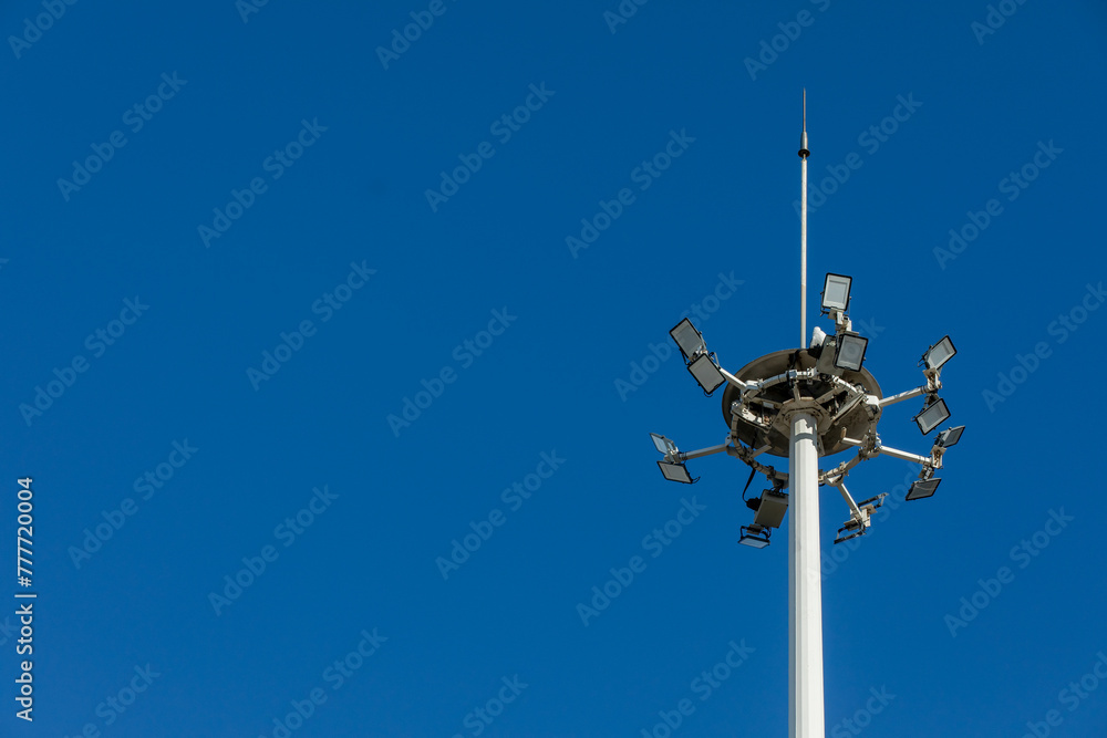 Urban Safety: Light Pole with Lighting Rod Against Dramatic Weather, Blue Sky