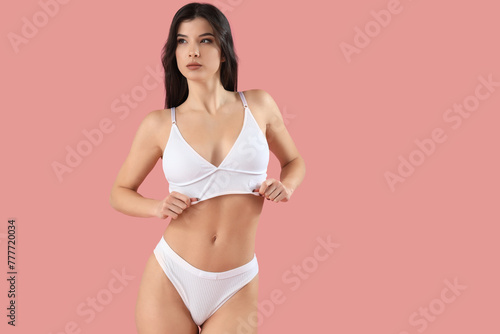 Beautiful young woman in wh...