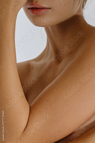 Close-up sensual woman's big plump lips of anonymous woman  photo