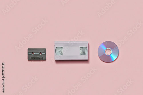 Audio tape cassette, vhs video cassette and compact disc in studio