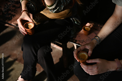 Drinking chai on the street in India photo