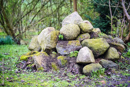 Ecological stone pile, a natural paradise in the garden, small caves and niches offer hiding places, protection and habitat for many animals, copy space, selected focus
