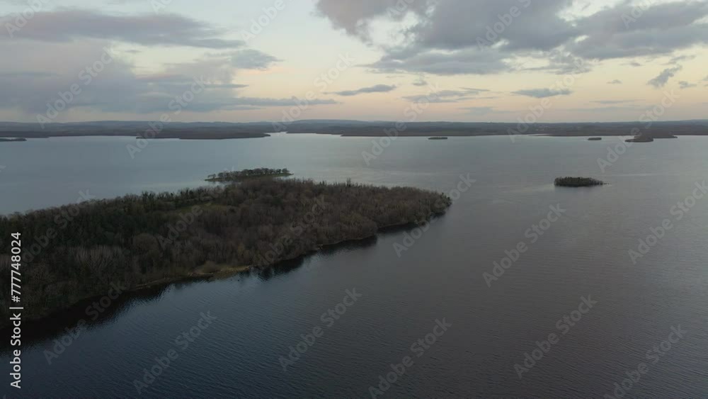 A drone shot of a lake on an overcast day at dusk. Lough Erne, Co. Fermanagh A drone shot of a lake on an overcast day at dusk. Lough Erne, Co. Fermanagh