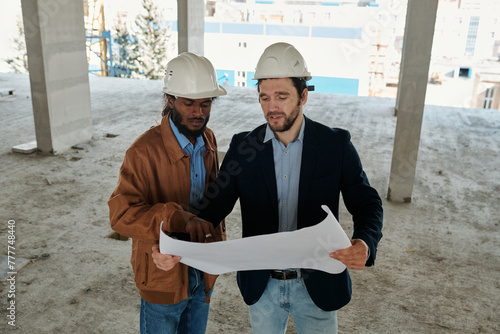 Engineer And Architech At Construction Site photo