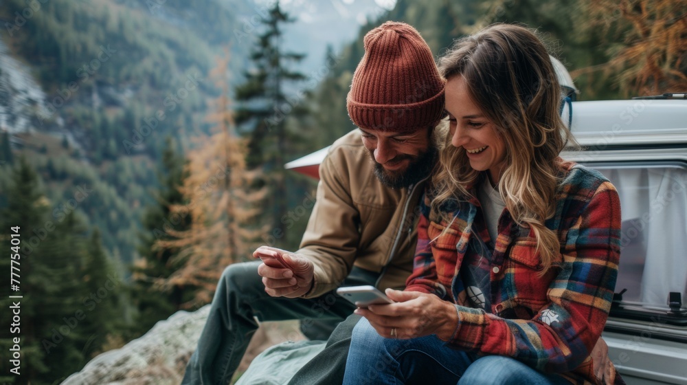 A man and woman sitting on top of a camper looking at their cell phones, AI A man and woman sitting on top of a camper looking at their cell phones, AI