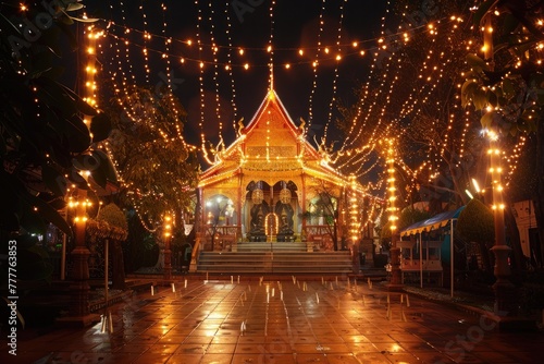 buddhist temple illuminated with lights at night