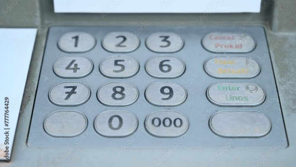 Keypads on cash machine, close up. ATM on the street. Automated teller machine. Keypads on cash machine, close up. ATM on the street. Automated teller machine.