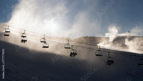 Chair lifts on the ski slopes photo