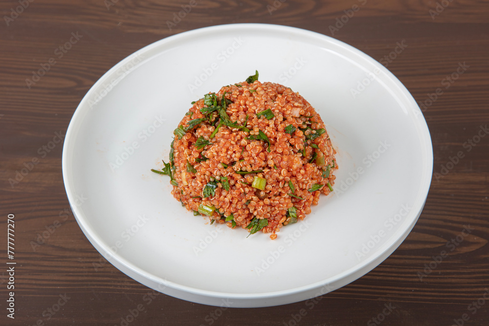 Quinoa salad with lentils and parsley in a bowl. Quinoa and lentils salad in a plate viewed from above - flat lay concept. Quinoa salad with lentils and parsley in a bowl. Quinoa and lentils salad in a plate viewed from above - flat lay concept.