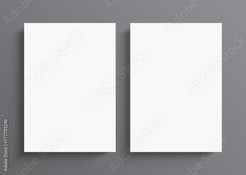 2 blank white paper posters hanging on a grey wall background. Poster gallery vector mockup for vertical art, image, or text placement.