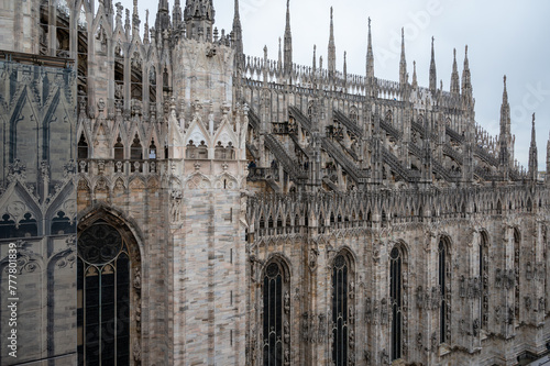 Architectural details of Gothic cathedral church in Milan, tourist attraction in northern Italy © barmalini
